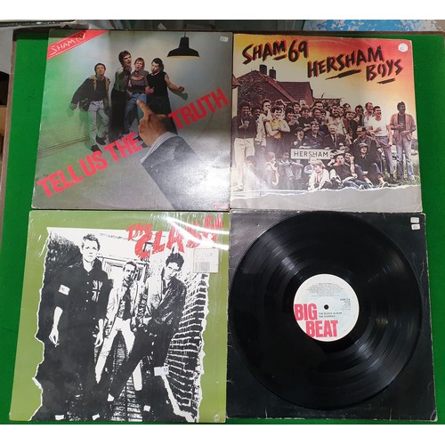 147 - Six punk vinyl Lps and two 12