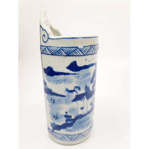 184 - A Chinese blue and white wall pocket depicting a landscape with figures, marks to the front, length ... 