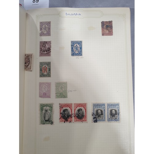 210 - A stamp album containing 19th century and later rare stamps. UK shipping £14.