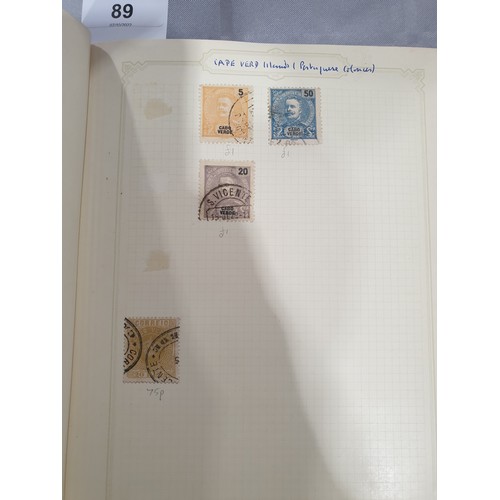 210 - A stamp album containing 19th century and later rare stamps. UK shipping £14.