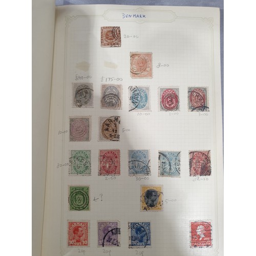 210 - A stamp album containing 19th century and later rare stamps. UK shipping £14.