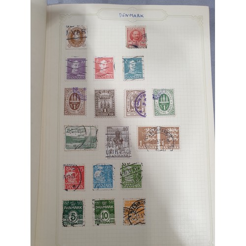 210 - A stamp album containing 19th century and later rare stamps. UK shipping £14.