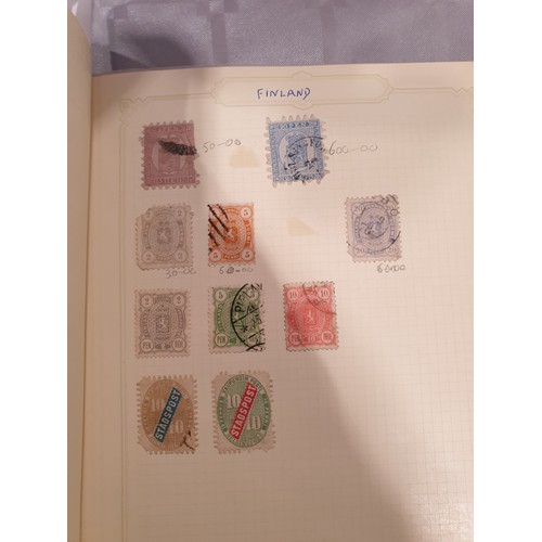 210 - A stamp album containing 19th century and later rare stamps. UK shipping £14.