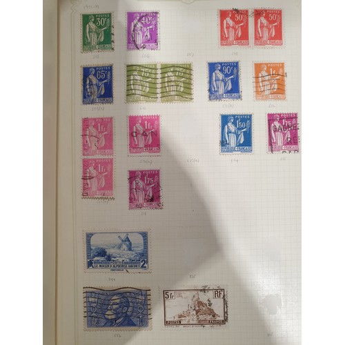 210 - A stamp album containing 19th century and later rare stamps. UK shipping £14.