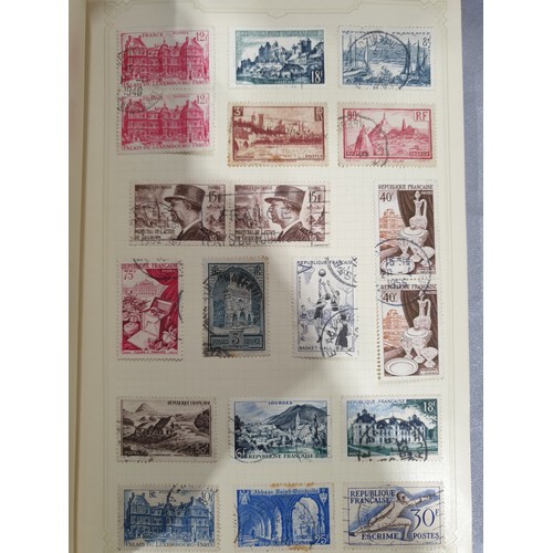 210 - A stamp album containing 19th century and later rare stamps. UK shipping £14.