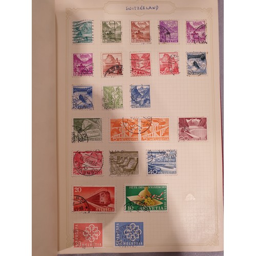 210 - A stamp album containing 19th century and later rare stamps. UK shipping £14.