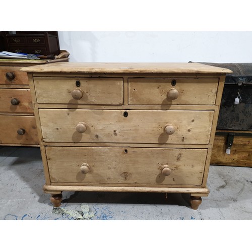 235 - An antique pine two over two chest of drawers, width 36