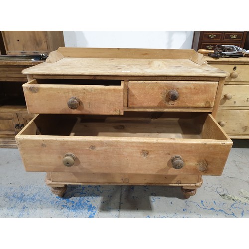 236 - An antique pine two over two chest of drawers, width 37