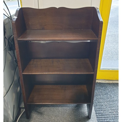 251 - An oak three heights bookcase, width 18.75