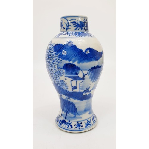 273 - A Kangxi blue and white porcelain vase decorated with fishermen, mark to the base, height 6.75