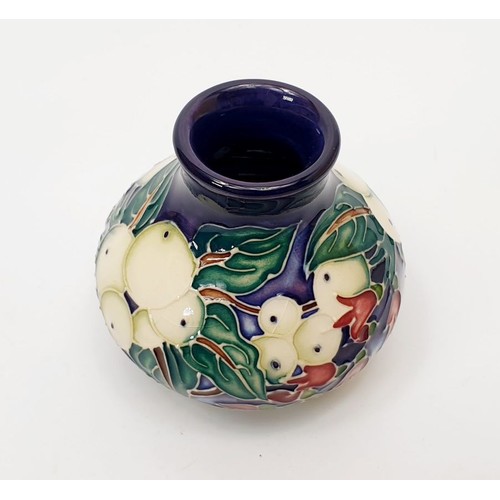 280 - A Moorcroft vase of squat form, height 2.25