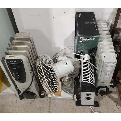 387 - Two oil filled radiators, two electric heaters, a desk fan and a steam cleaner. No shipping. Arrange... 