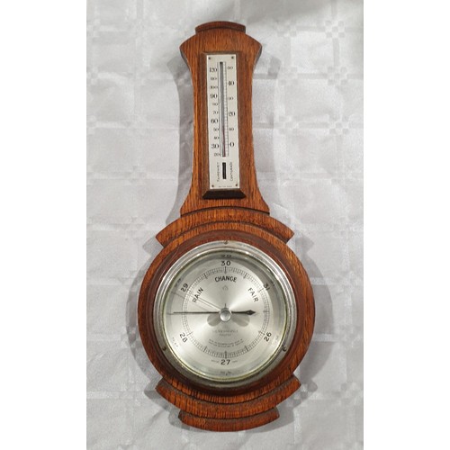 435 - A vintage oak barometer, length 14