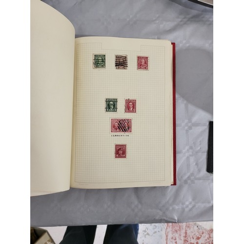 211 - A stamp album containing Penny Reds and one other book containing antique American stamps. UK shippi... 