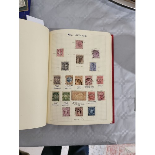 211 - A stamp album containing Penny Reds and one other book containing antique American stamps. UK shippi... 