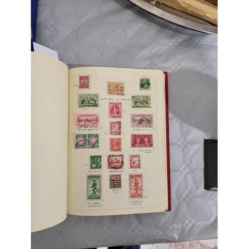 211 - A stamp album containing Penny Reds and one other book containing antique American stamps. UK shippi... 