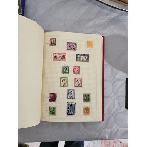 211 - A stamp album containing Penny Reds and one other book containing antique American stamps. UK shippi... 