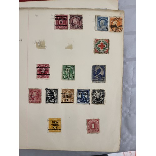 211 - A stamp album containing Penny Reds and one other book containing antique American stamps. UK shippi... 