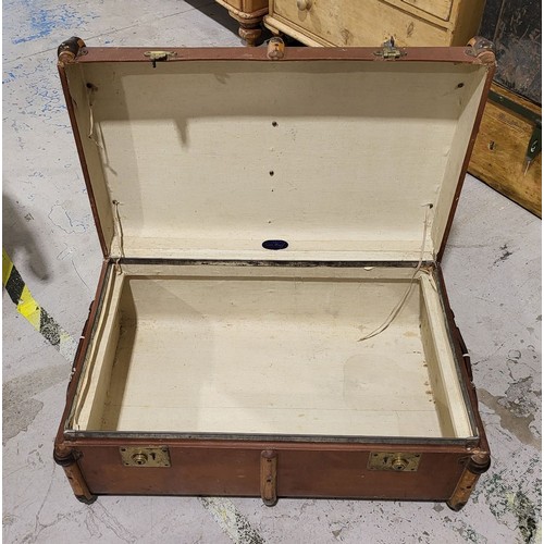 227 - A vintage travelling trunk, length 30.5