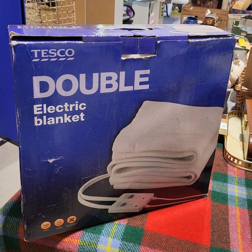 381 - A new in box Tesco electric blanket. No shipping. Arrange collection or your own packer and shipper,... 