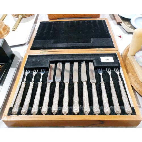 10 - A cased silver hallmarked handled dessert knife and fork set, Sheffield 1955. UK shipping £14.