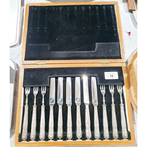 10 - A cased silver hallmarked handled dessert knife and fork set, Sheffield 1955. UK shipping £14.