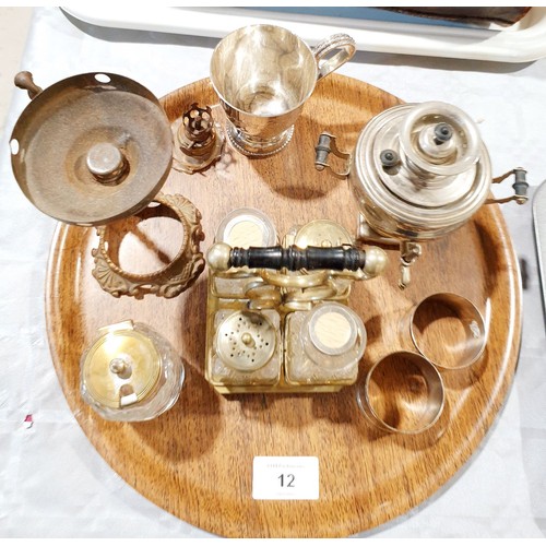 12 - A selection of metalware including a vapour lamp. UK shipping £14.