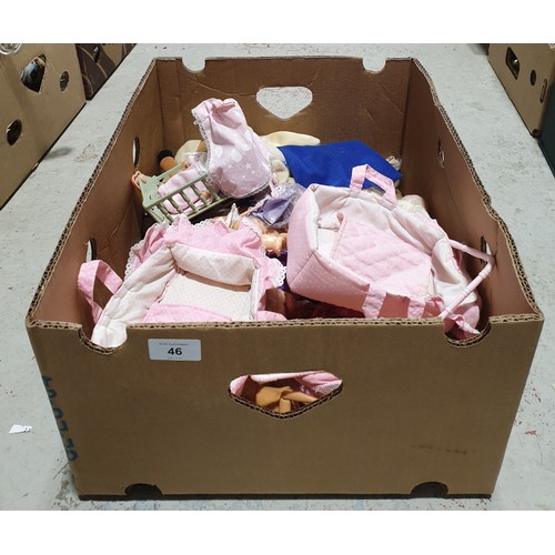 46 - A box of toys and soft toys including Barbie. UK shipping £14.