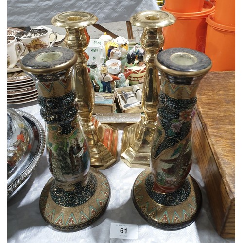 61 - A pair of brass candlesticks, height 10.75