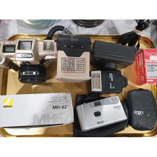 87 - A Nokina KC2000 camera together with other cameras and accessories. UK shipping £14.