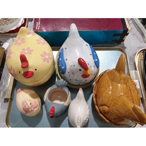 133 - Three ceramic chicken egg basket and three smaller ceramic chickens. No shipping. Arrange collection... 