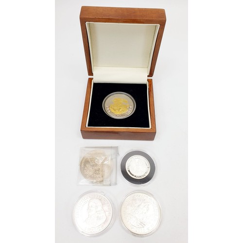 297 - Silver and other proof coins including 2010 1oz silver Britannia. UK shipping £14.