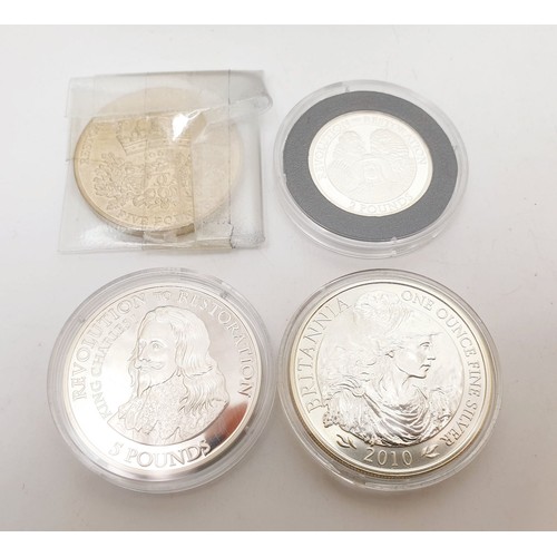 297 - Silver and other proof coins including 2010 1oz silver Britannia. UK shipping £14.