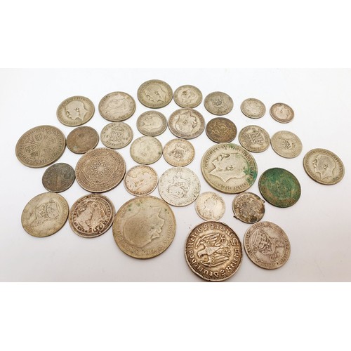 300 - A selection of silver British and foreign coinage, weight 155g. UK shipping £14.