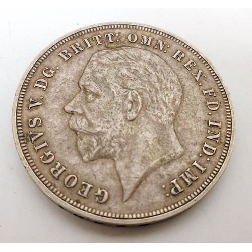 302 - A crown, 1935. UK shipping £14.