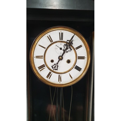 169 - An antique Vienna wall clock, length 39.5