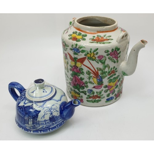 204 - A Chinese blue and white teapot with mark to the base, height 3.75