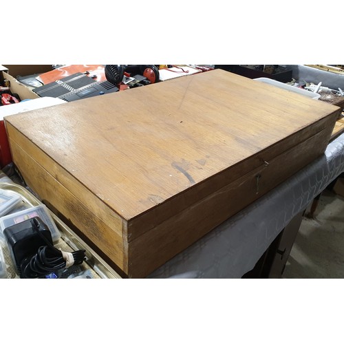 463 - A box containing wooden letters, width 30.25