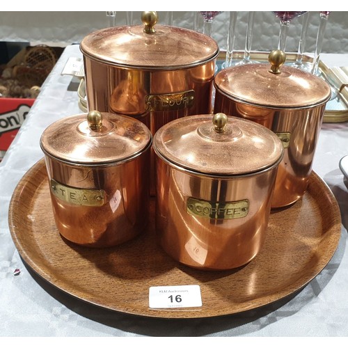 16 - Four copper finish kitchen canisters, the tallest 6.5