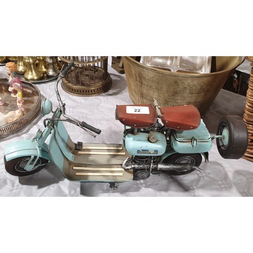 22 - A tin plate model of a Lambretta scooter, length 16