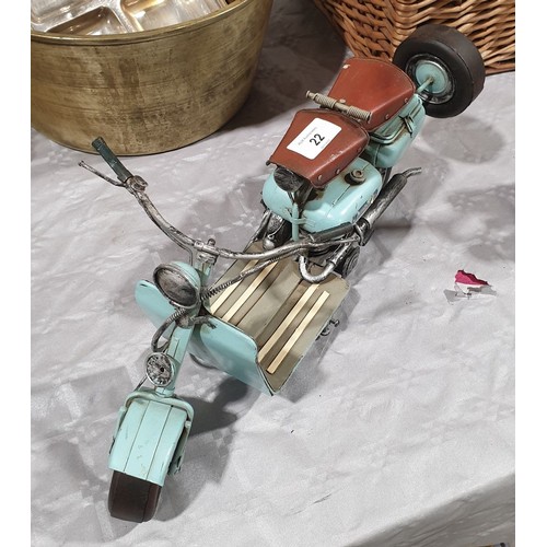 22 - A tin plate model of a Lambretta scooter, length 16