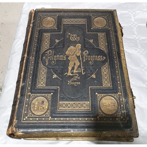 31 - An antique leather and brass bound copy of John Bunyan's 