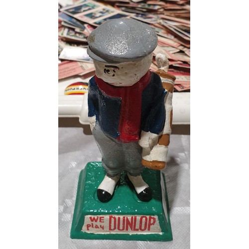 40 - A cast iron Dunlop golfing figure, height 5.5