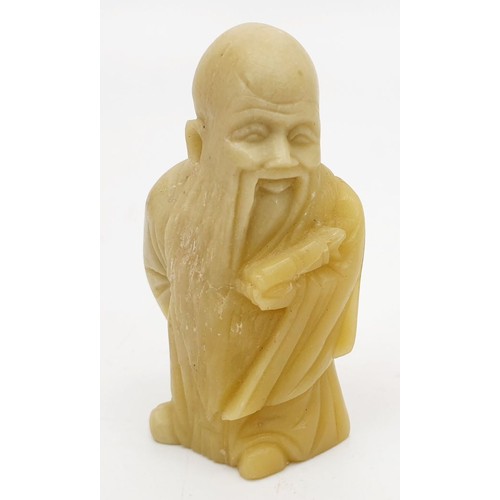 335 - A Chinese hard stone carving of an elder, height 2.5