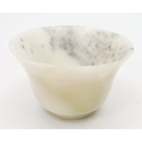 336 - An antique Chinese mutton jade bowl, height 1.25