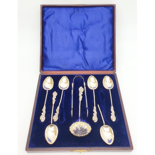 353 - A set of cased silver hallmarked coffee spoons, tongs and sugar sifter, one spoon A/F, Birmingham 18... 