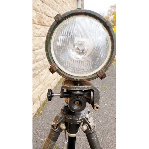 259 - A French fully adjustable tripod with a flood light mounted to it. No Shipping. Arrange collection o... 