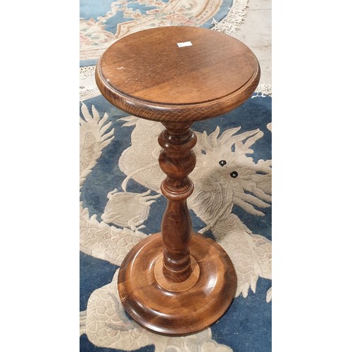 273 - A wooden plant stand, height 23.5