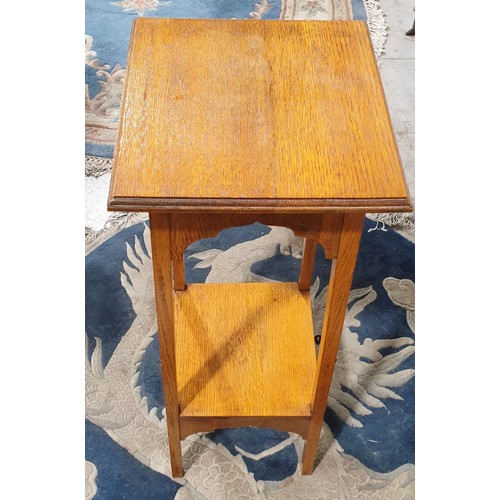 275 - An early 20th century oak plant stand, height 36