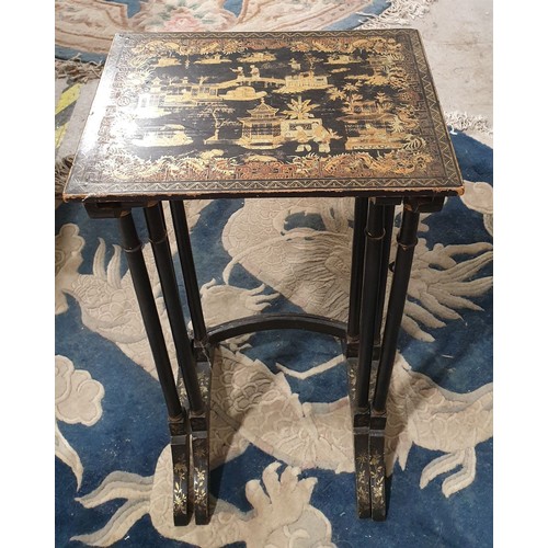 276 - A nest of two chinoiserie tables, the tallest height 27